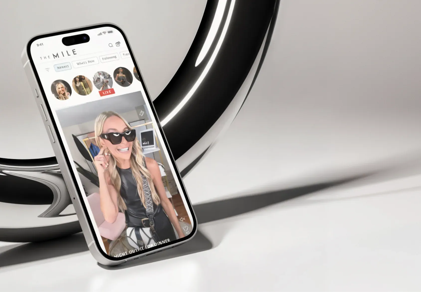 The Mile app on a phone: a creator hosting a shoppable show