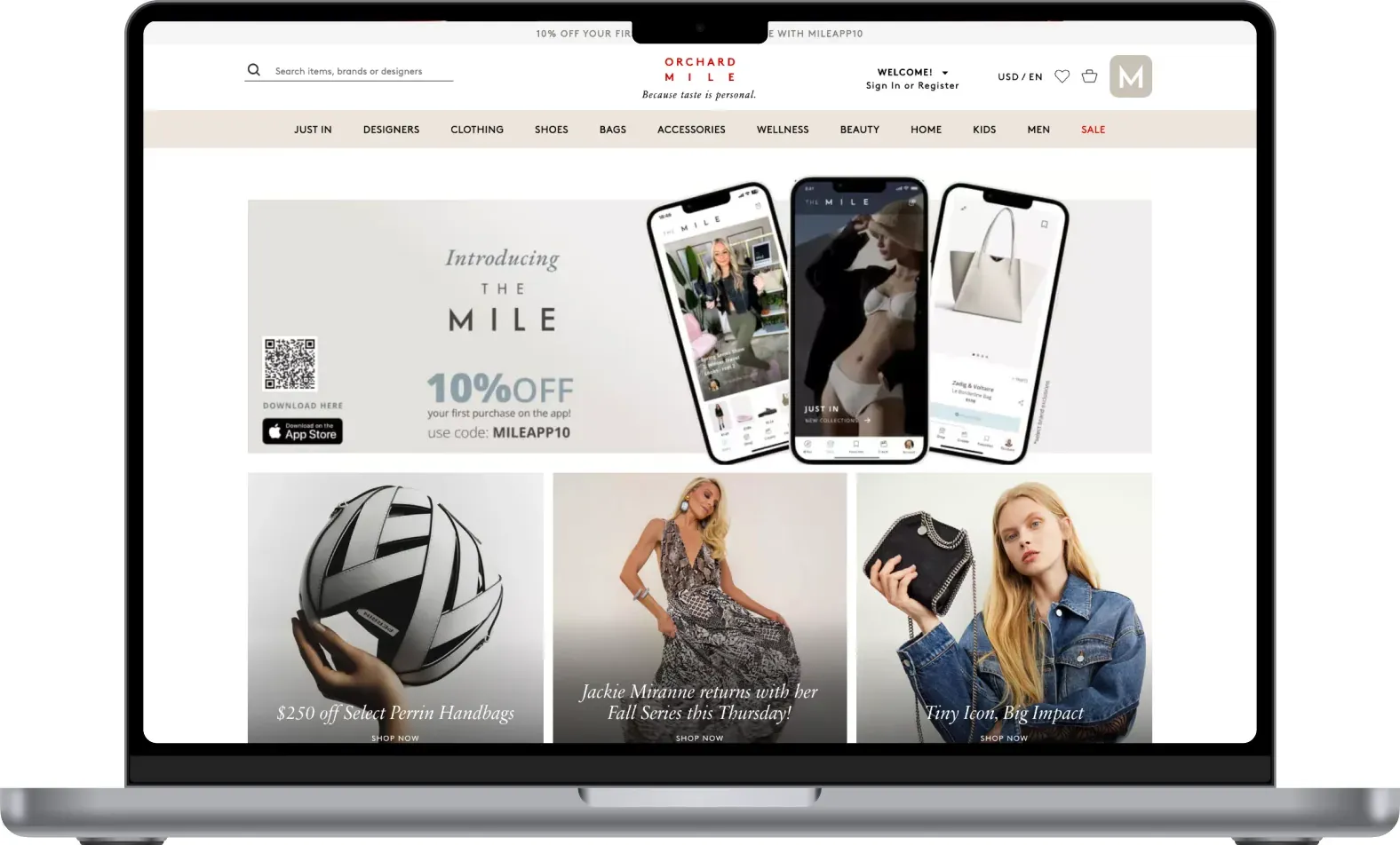 The Orchard Mile homepage on a laptop